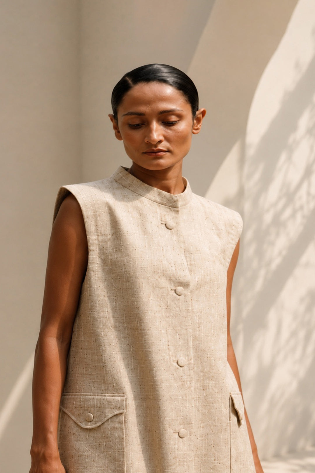 Natural beige utility inspired sleeveless overlay dress with functional detailing