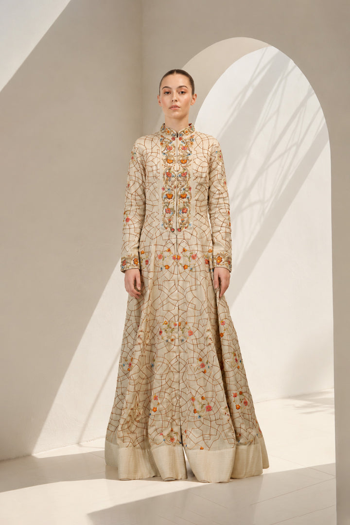 Ivory embroidered full-length long jacket dress featuring intricate geometric &amp; floral embroidery, elegant mandarin collar with concealed front closure, full-length sleeves.