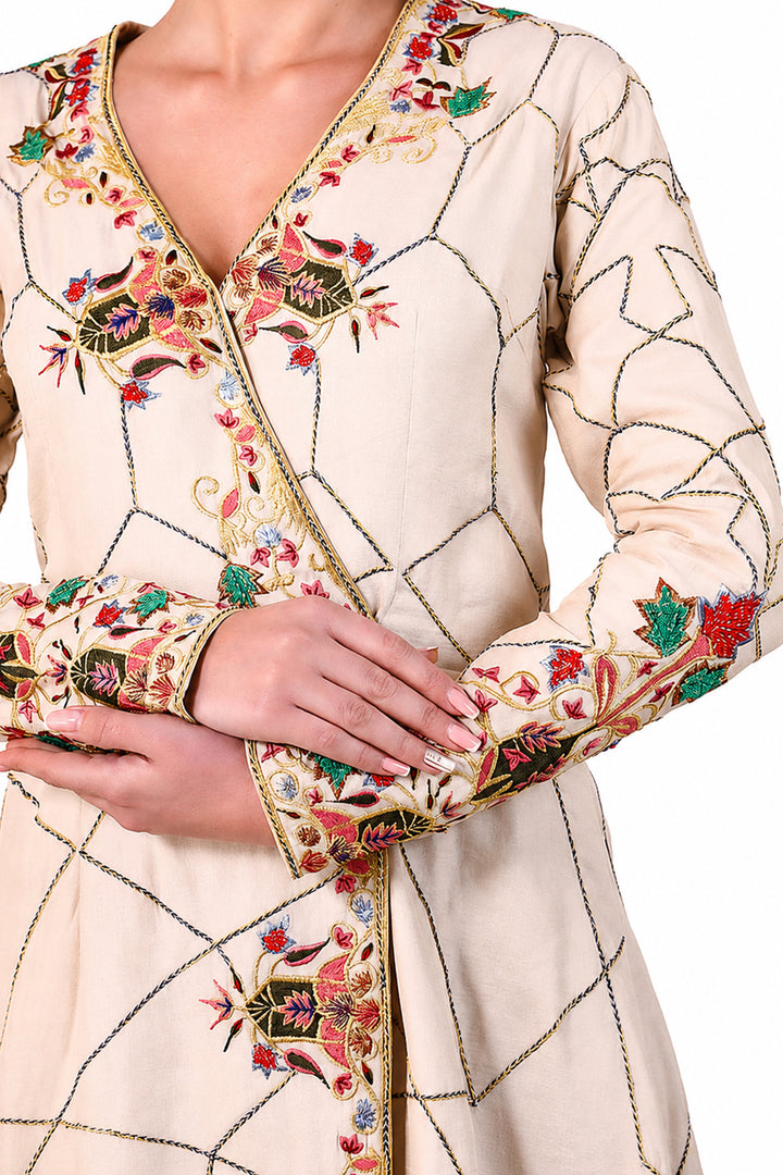Ivory elegant overlap anarkali featuring flattering V-neckline with full sleeves, and adorned with delicate geometric linework &amp; multicolor floral embroidery.