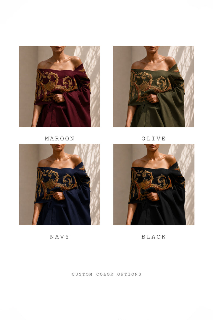 Ivory draped ensemble featuring off-shoulder embroidered stole, sculptural layering.