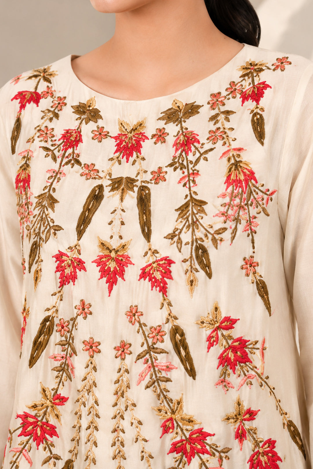 Ivory A-line dress featuring classic round neckline &amp; adorned with intricate floral embroidery.