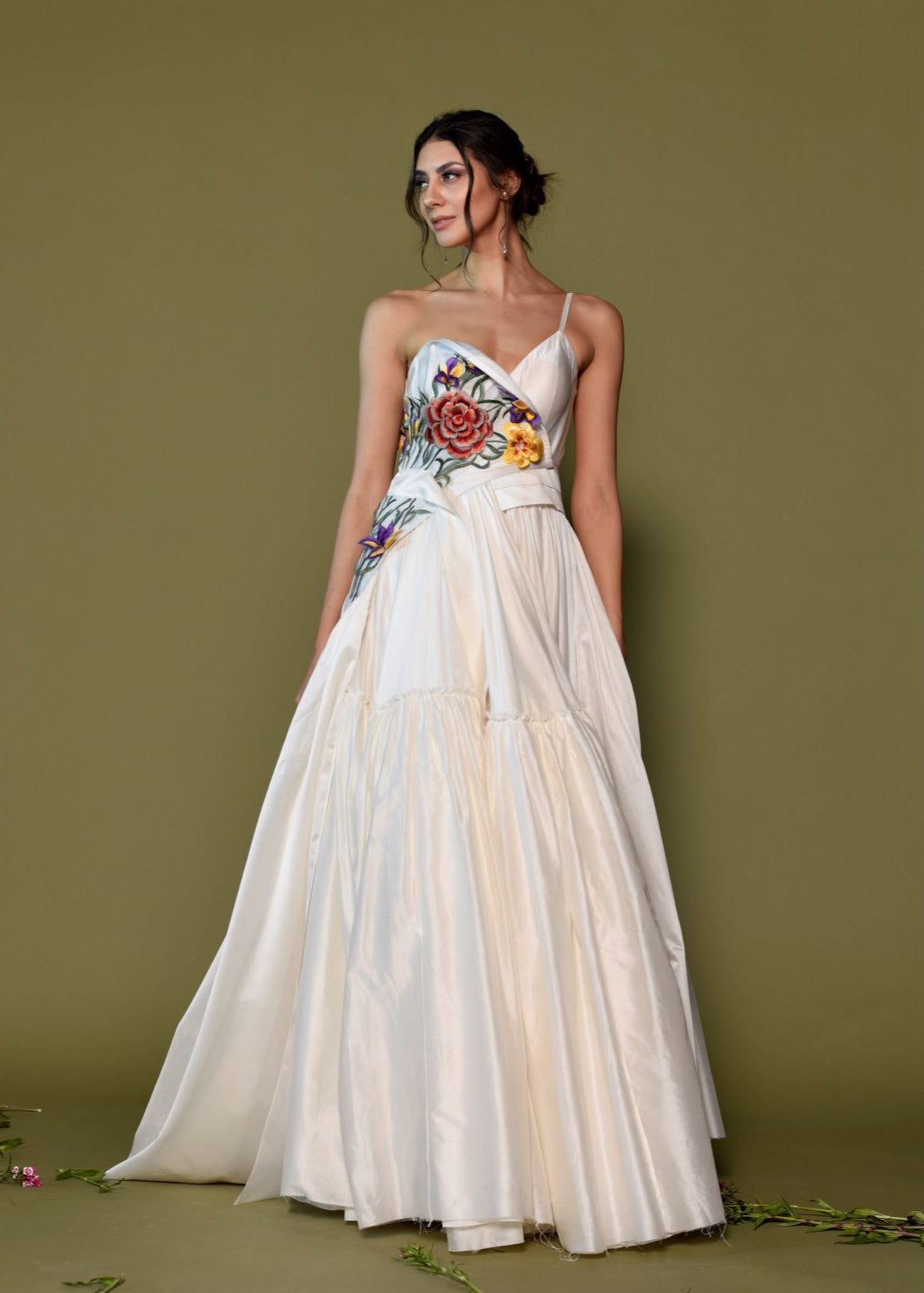 One-shoulder neckline with delicate spaghetti straps gown