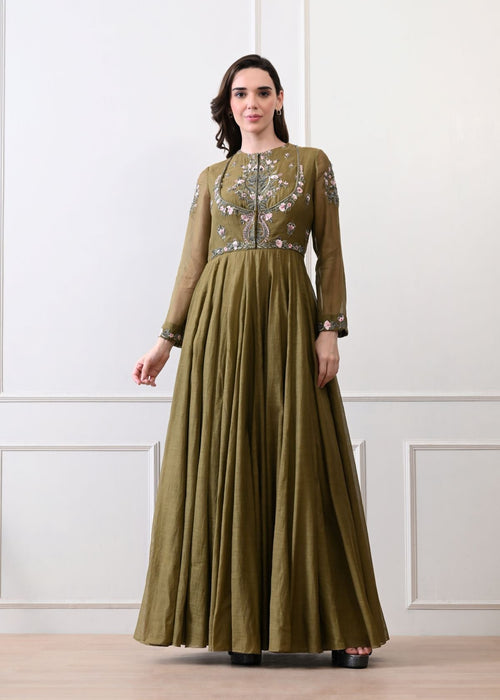 An elegant olive gown with exquisite floral and ornate embroidery