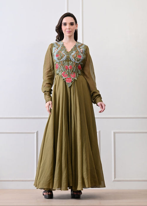 A beautiful olive dress featuring bold floral embroidery