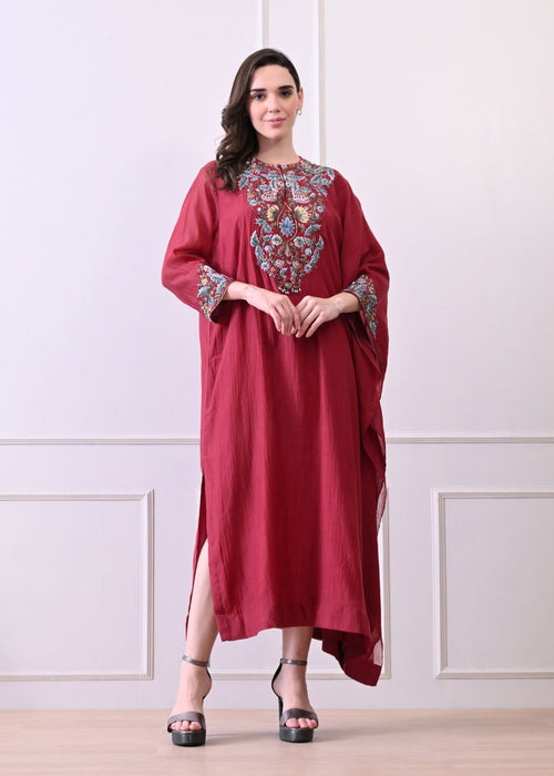 A comfortable yet elegant maroon kaftan-style dress