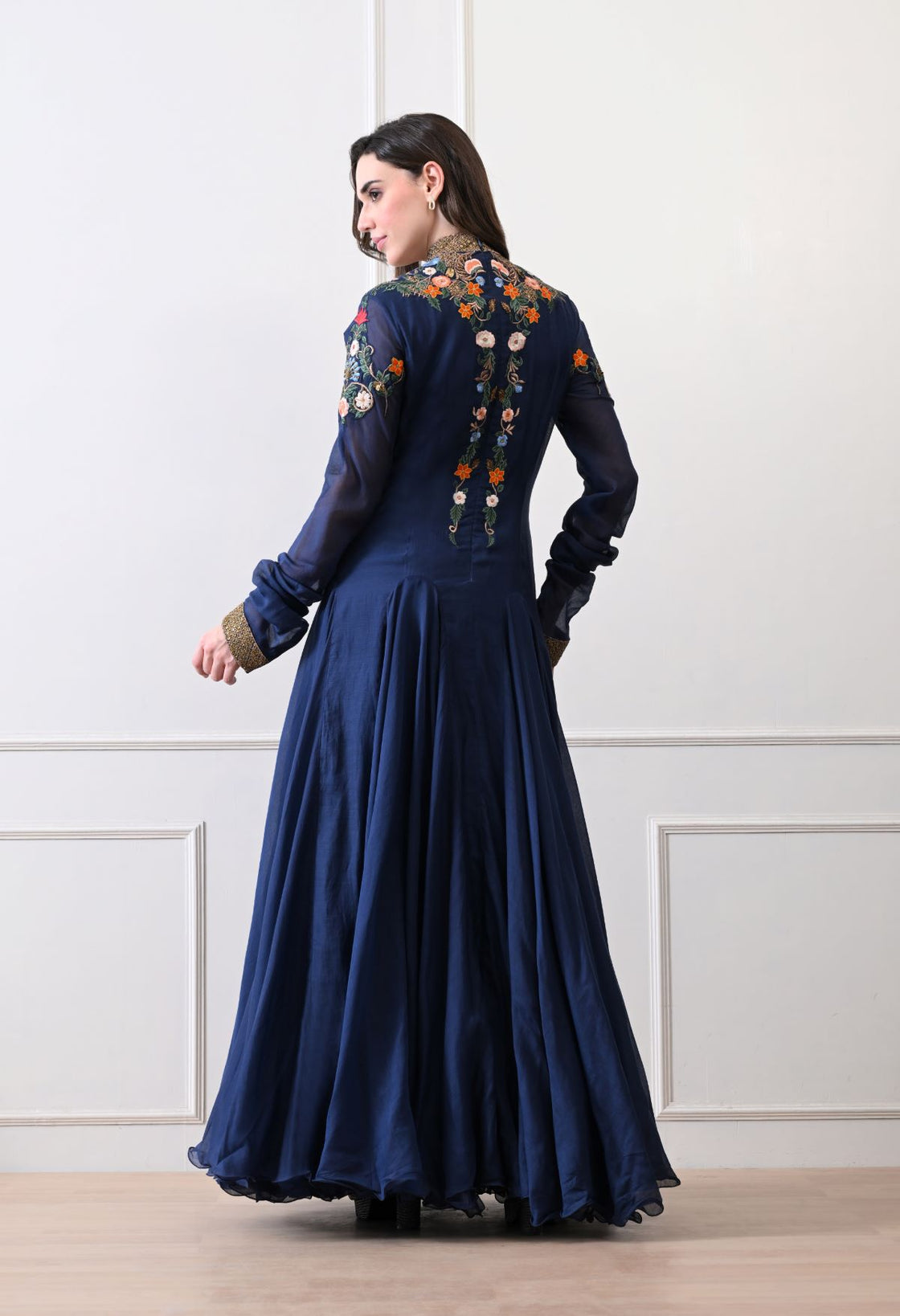 A elegant black floor-length anarkali-style dress