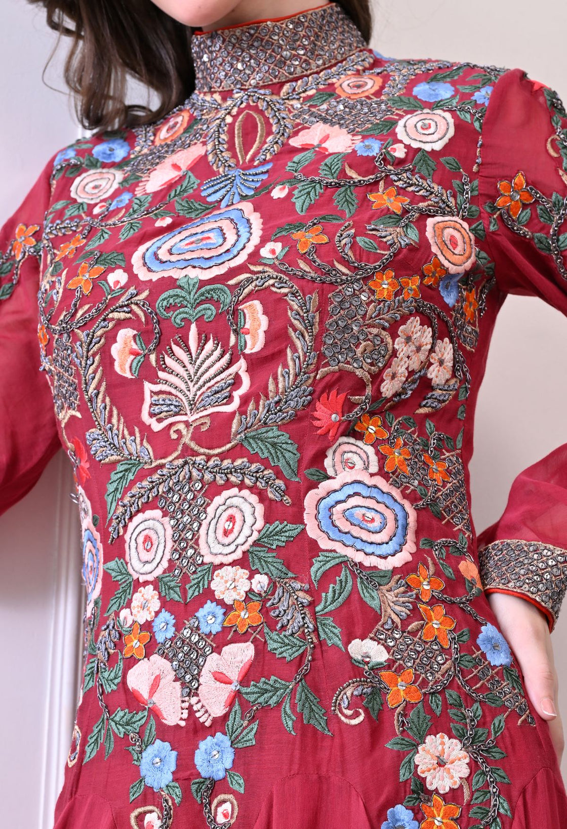 A elegant maroon floor-length anarkali-style dress
