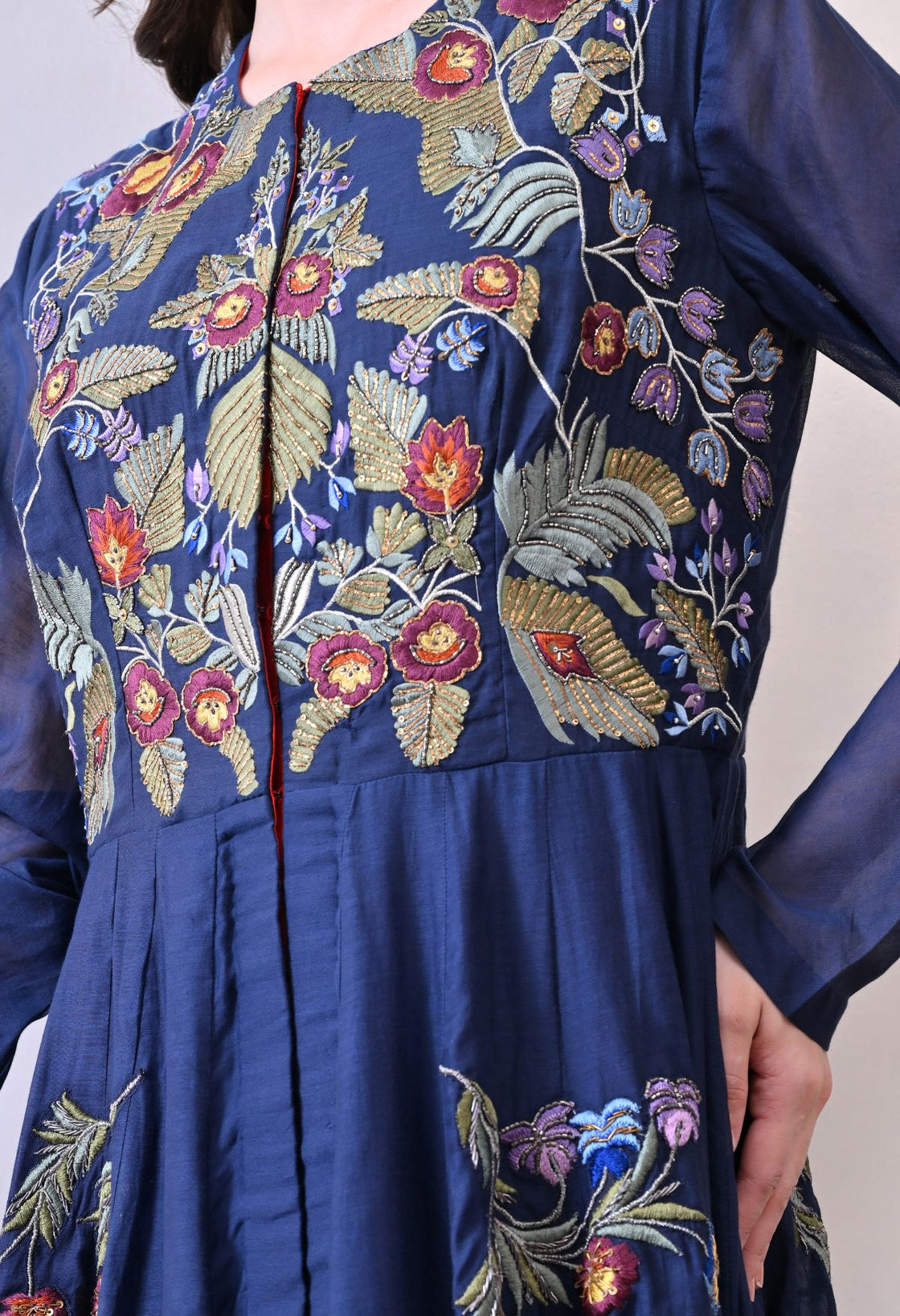 A elegant blue floor-length anarkali-style dress
