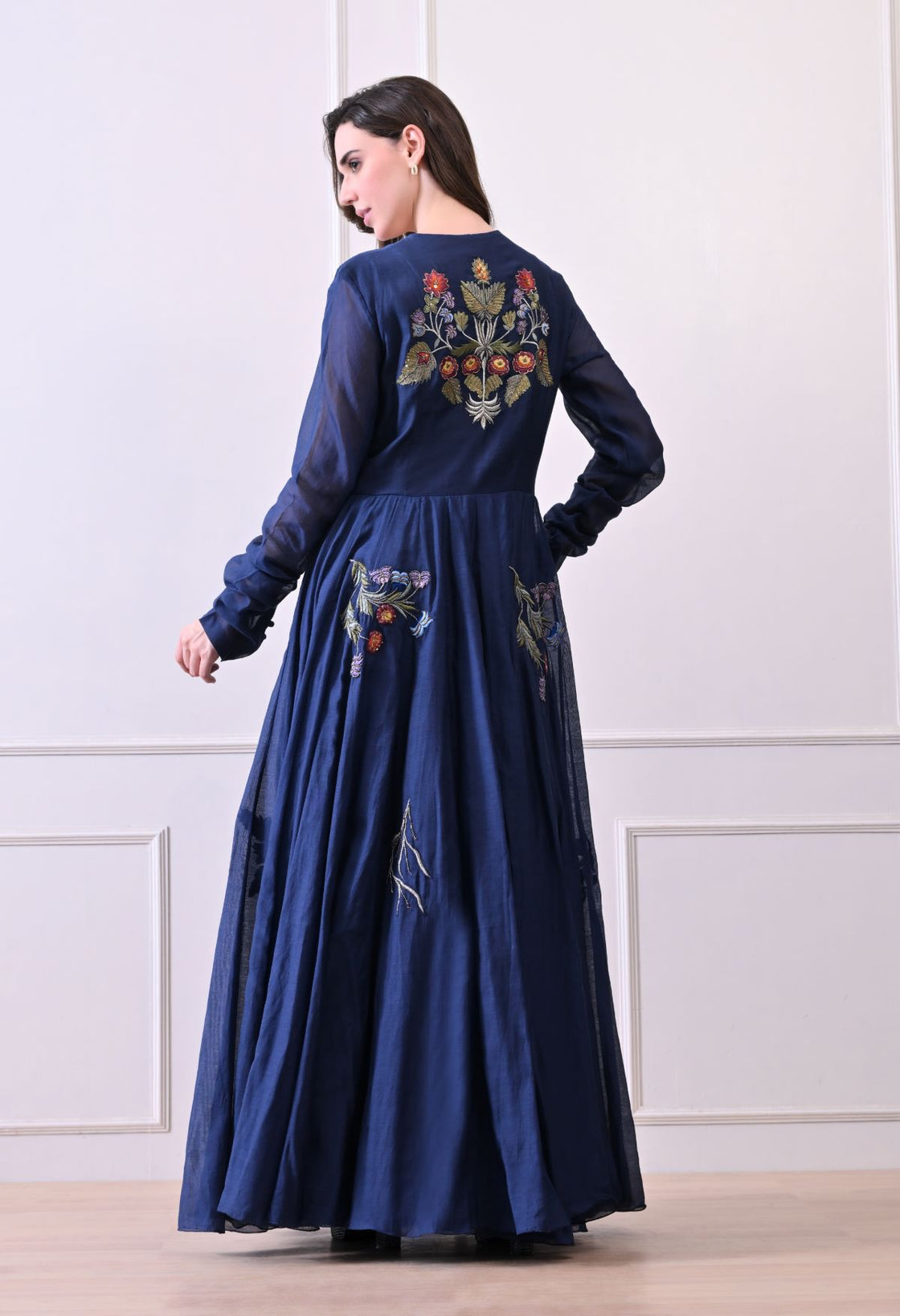 A elegant blue floor-length anarkali-style dress
