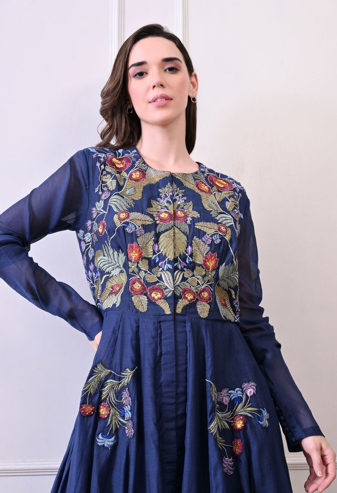 A elegant blue floor-length anarkali-style dress