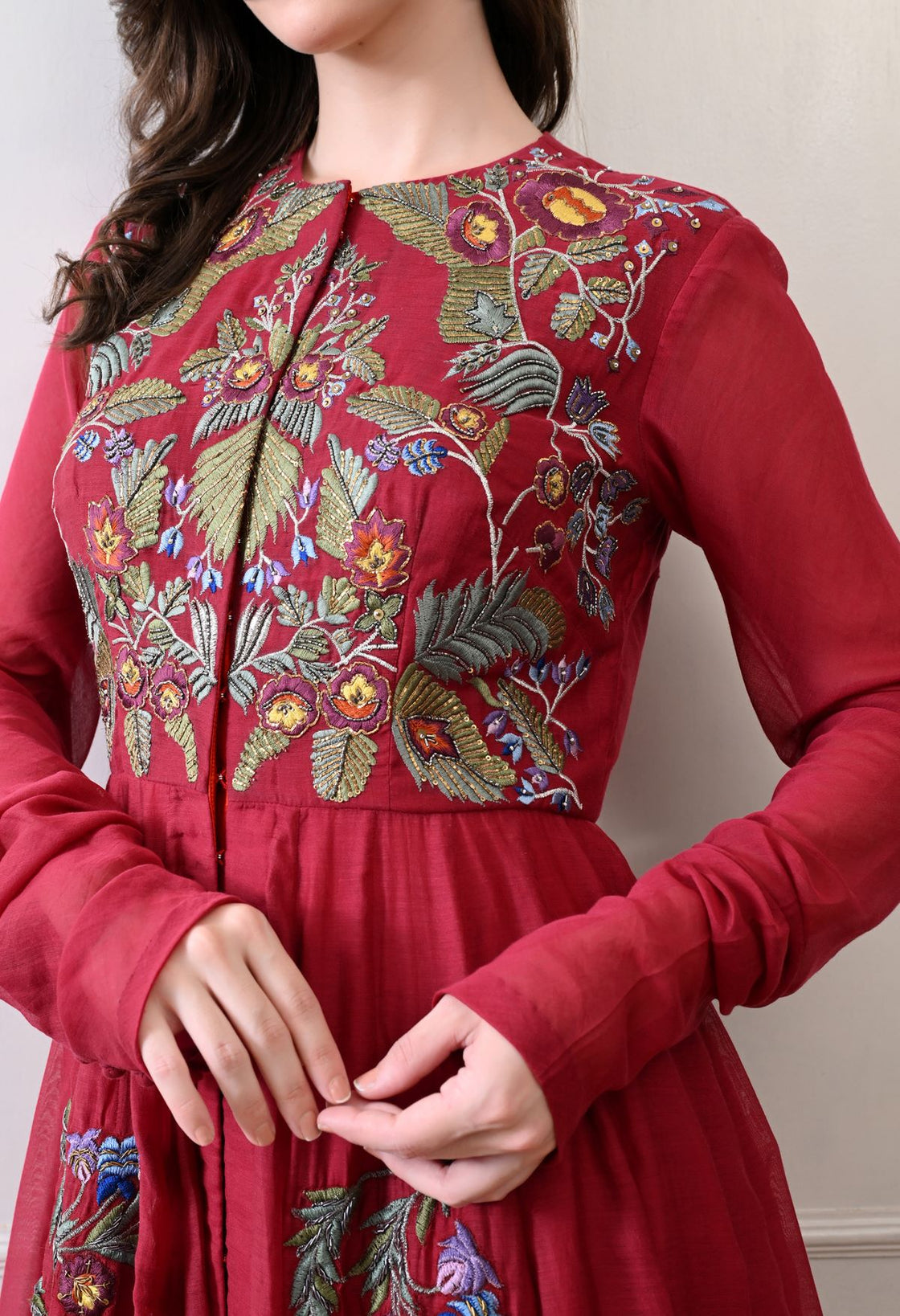 A elegant maroon floor-length anarkali-style dress