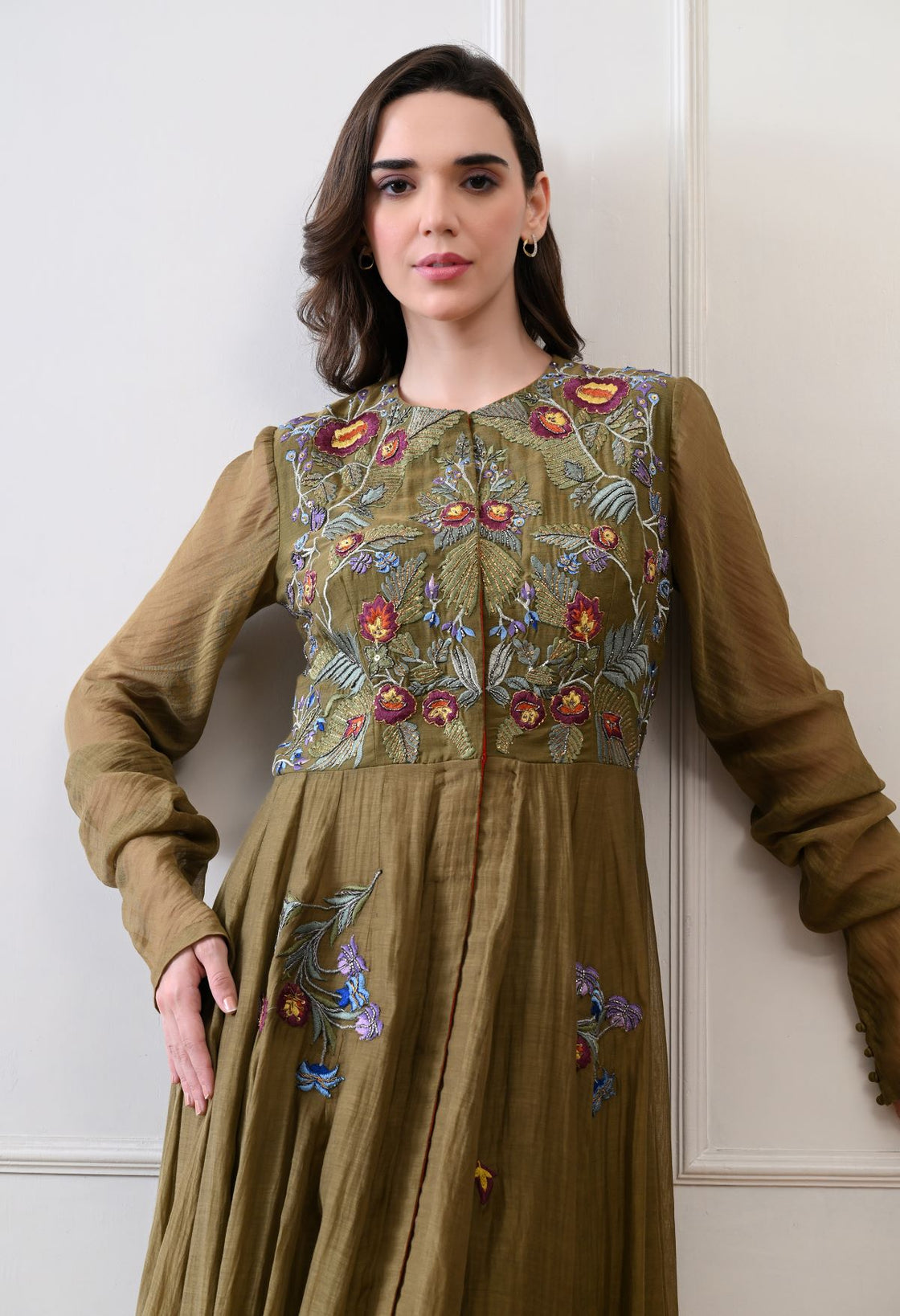 A elegant olive floor-length anarkali-style dress