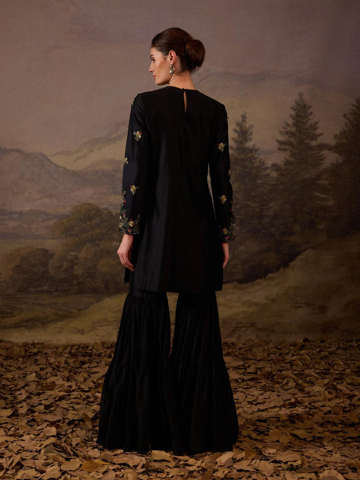 A black kurti and palazzo set.