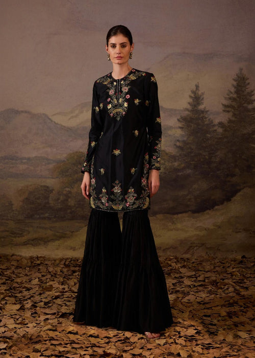 A black kurti and palazzo set.