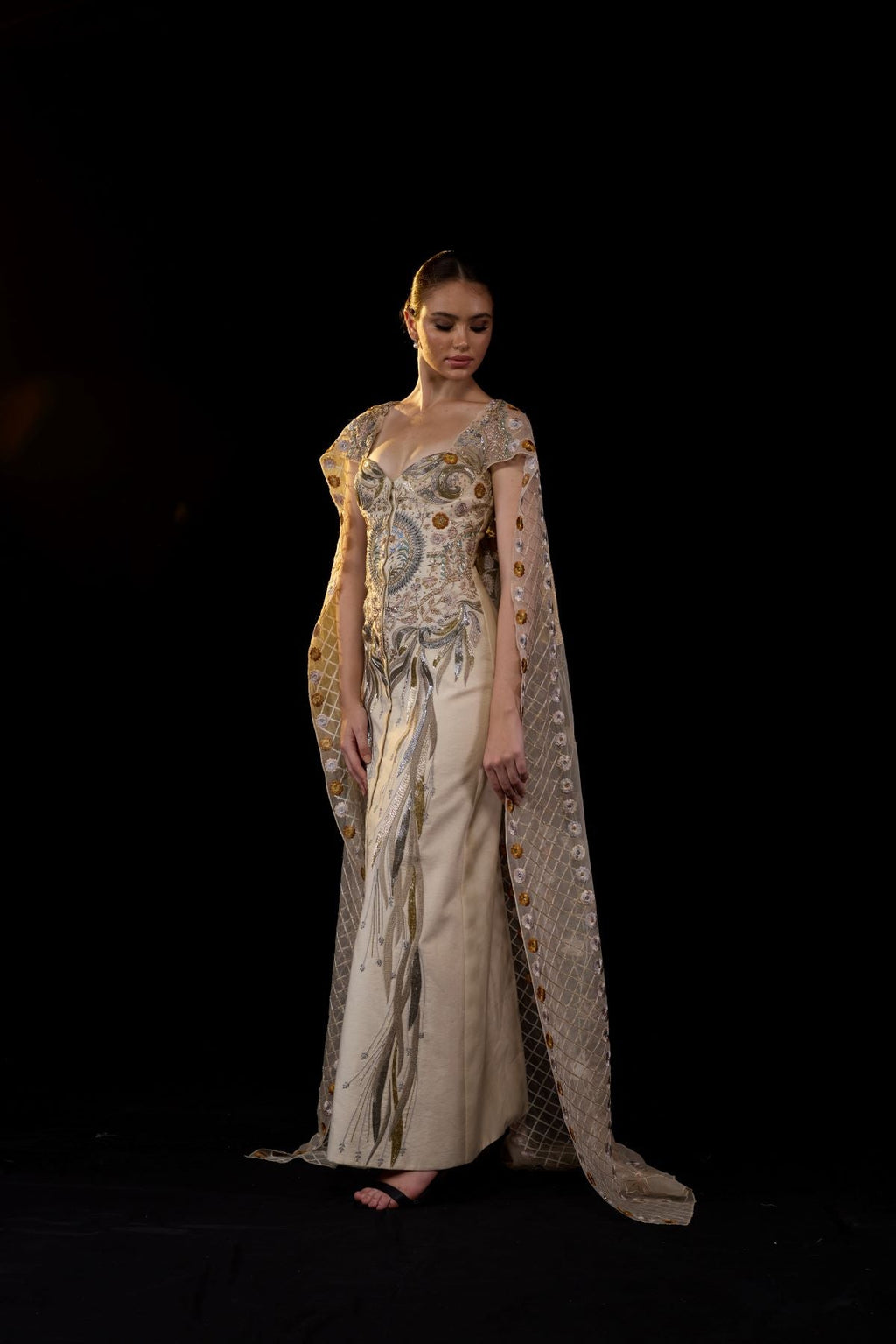 A sheer neck, floor - length embroidered gown cape drapes from the shoulders - samantchauhan Apparel & Accessories