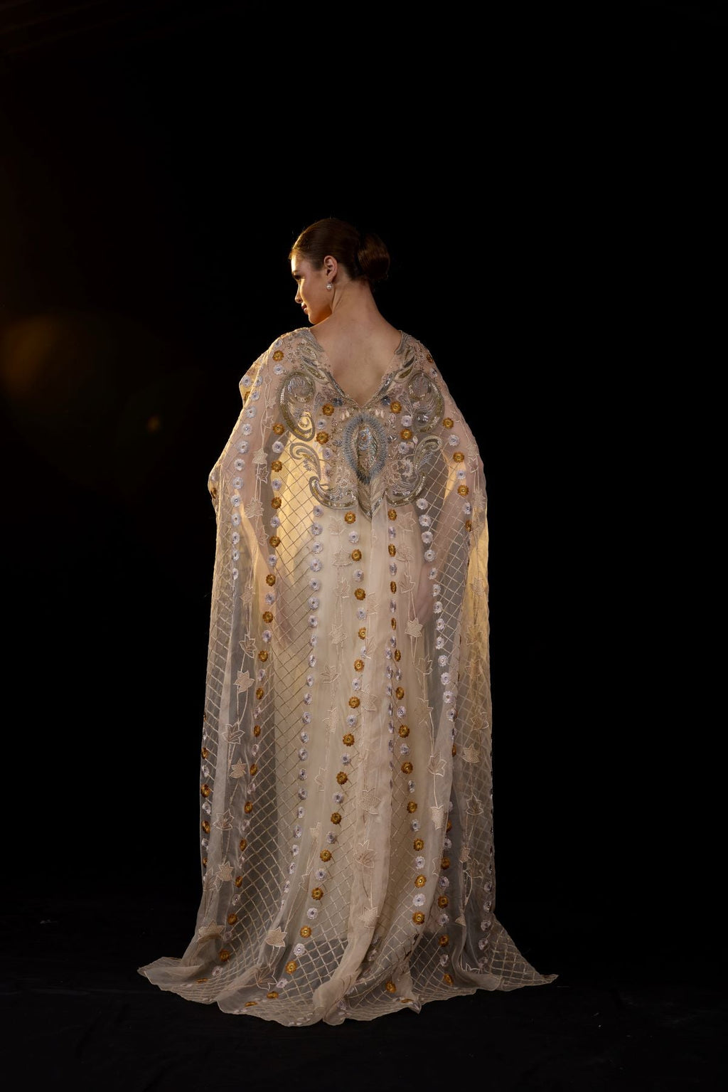 A sheer neck, floor - length embroidered gown cape drapes from the shoulders - samantchauhan Apparel & Accessories