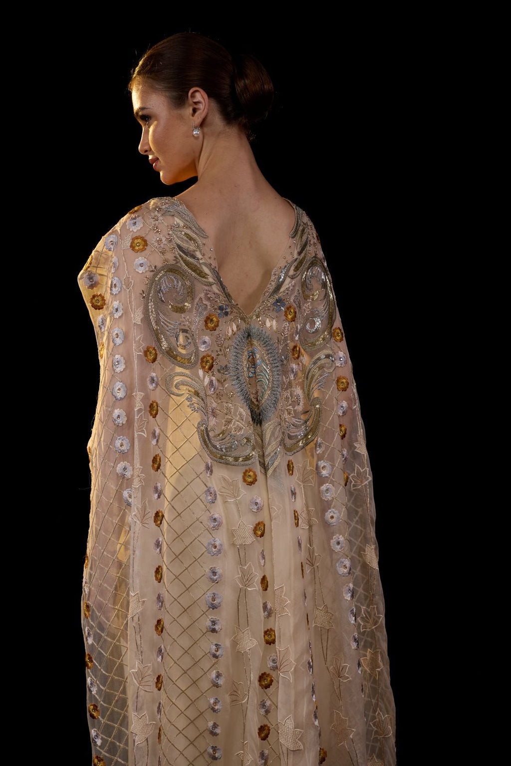 A sheer neck, floor - length embroidered gown cape drapes from the shoulders - samantchauhan Apparel & Accessories