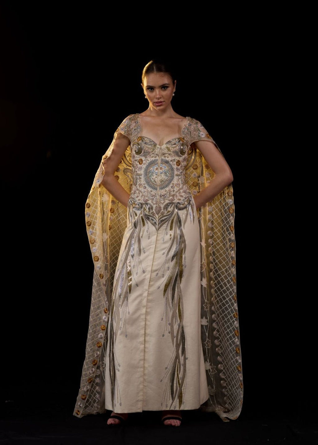 A sheer neck, floor - length embroidered gown cape drapes from the shoulders - samantchauhan Apparel & Accessories