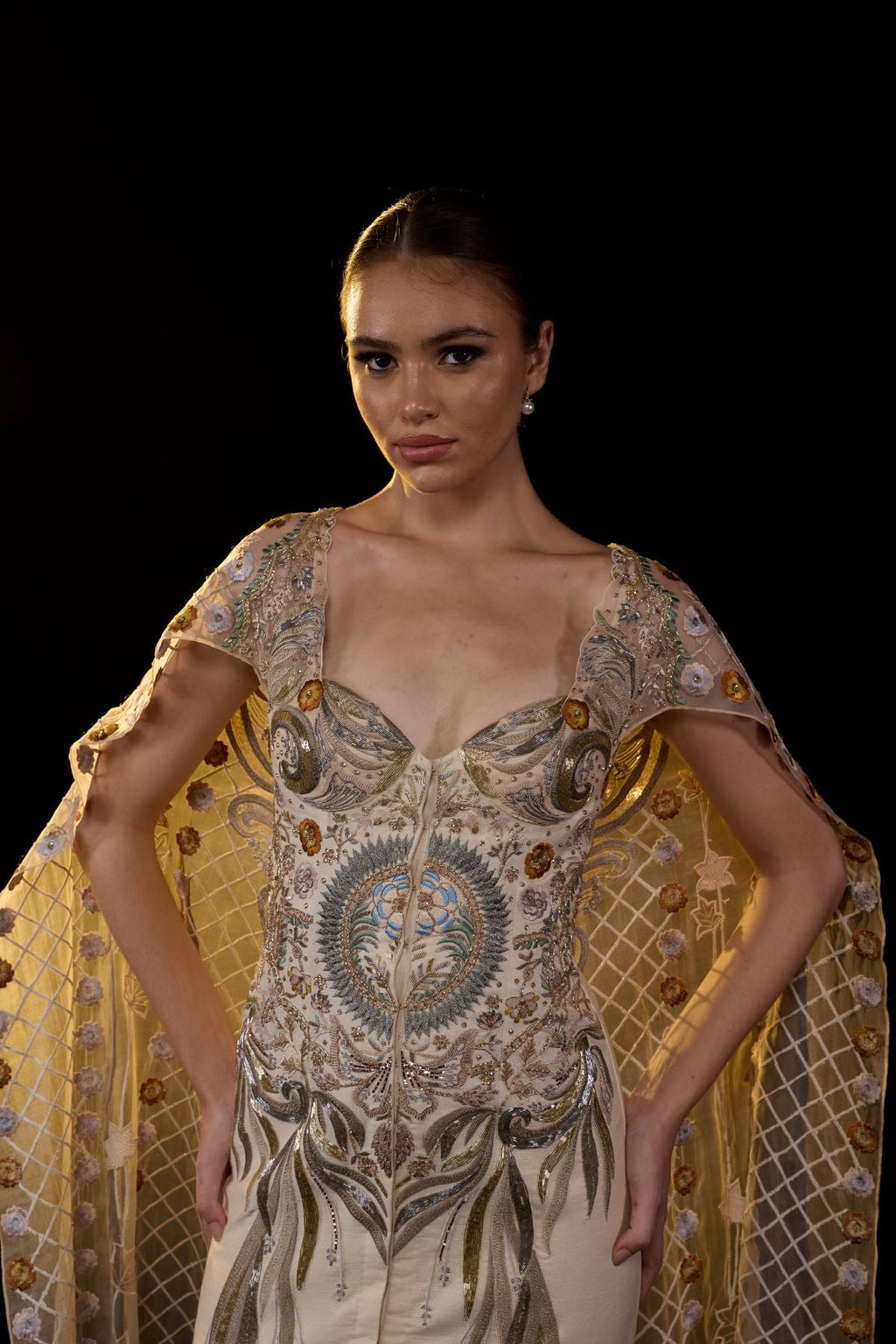 A sheer neck, floor - length embroidered gown cape drapes from the shoulders - samantchauhan Apparel & Accessories