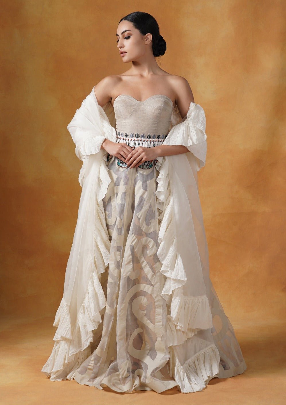 A tube corset in cotton paired with an Ivory appliqué work skirt and organza Dupatta with cotton frill. - samantchauhan Apparel & Accessories