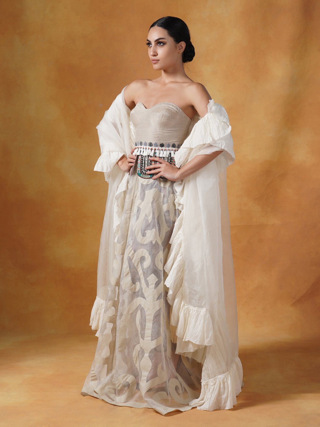 A tube corset in cotton paired with an Ivory appliqué work skirt and organza Dupatta with cotton frill. - samantchauhan Apparel &amp; Accessories