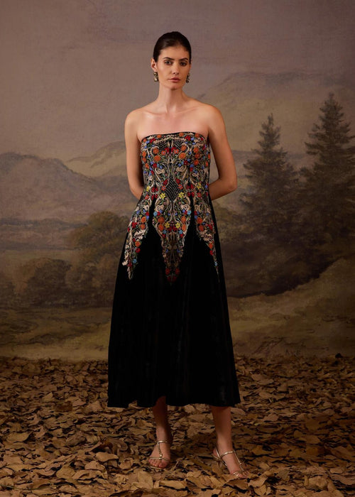 Chic black strapless dress with a multi embroidered bodice.