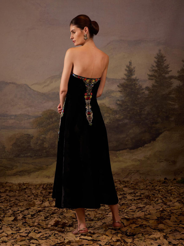Chic black strapless dress with a multi embroidered bodice.