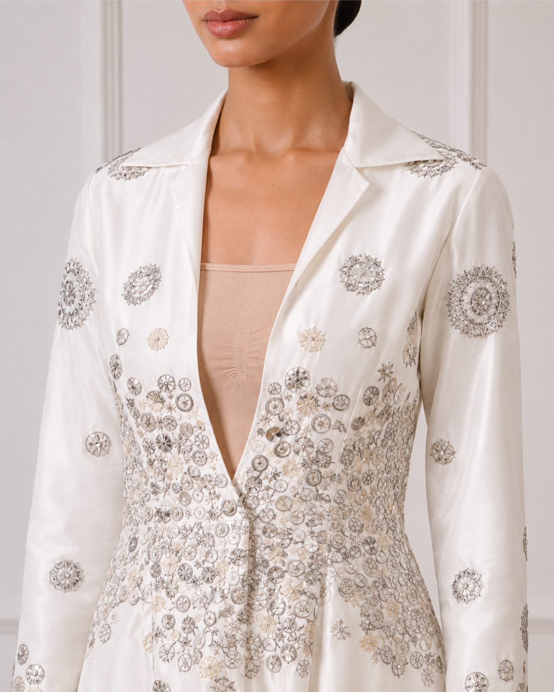 A cotton silk collared jacket with a plunging neckline.