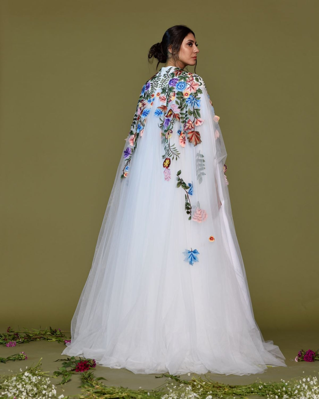 Ethereal White Tulle Gown with embroidered Floral Cape.