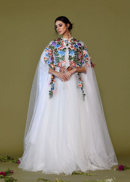 Ethereal White Tulle Gown with embroidered Floral Cape.