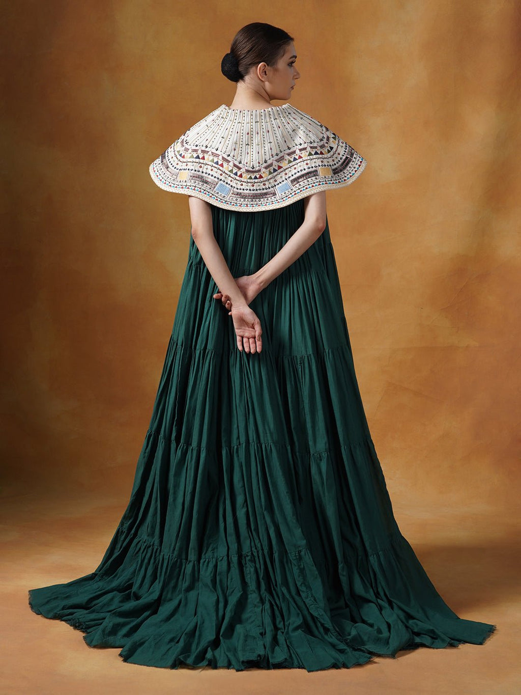 Floor length cotton tier dress in olive green. It is topped with a heavy embroidered cape around the neckline and shoulders. - samantchauhan Apparel & Accessories