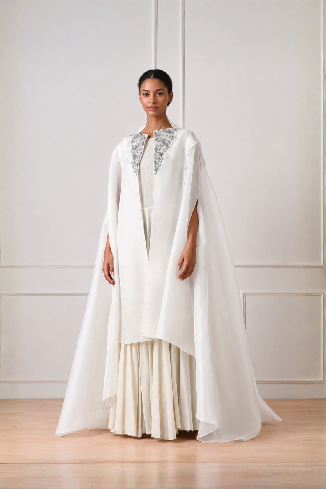 Ivory Front Open Cape With Embroidery Highlight On Neckline Paired With Dress