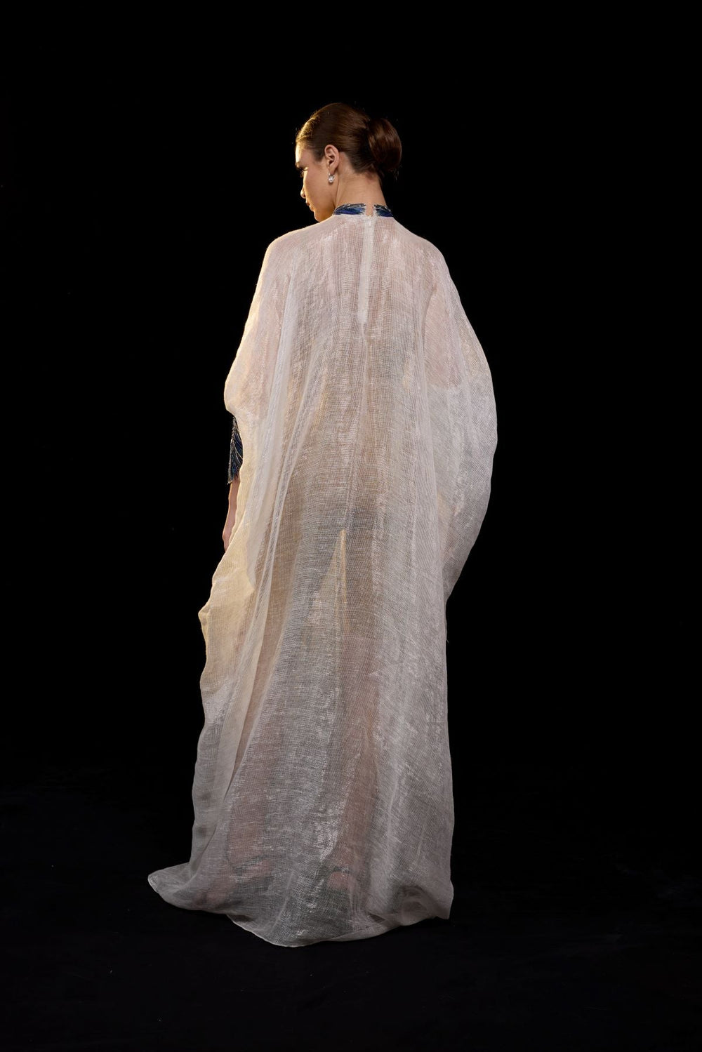 Ivory Draped Gown with Blue Embroidery.