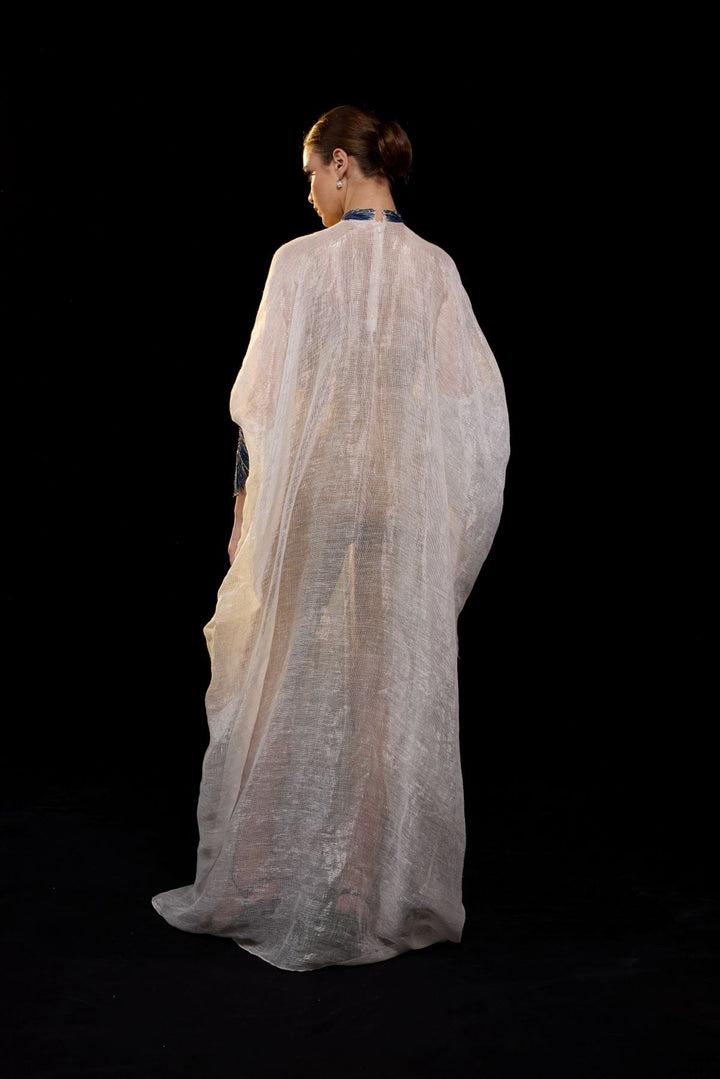 Ivory Draped Gown with Blue Embroidery.