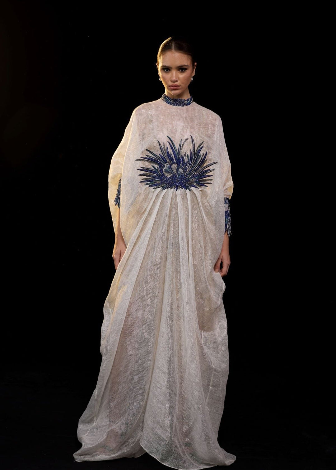 Ivory Draped Gown with Blue Embroidery.