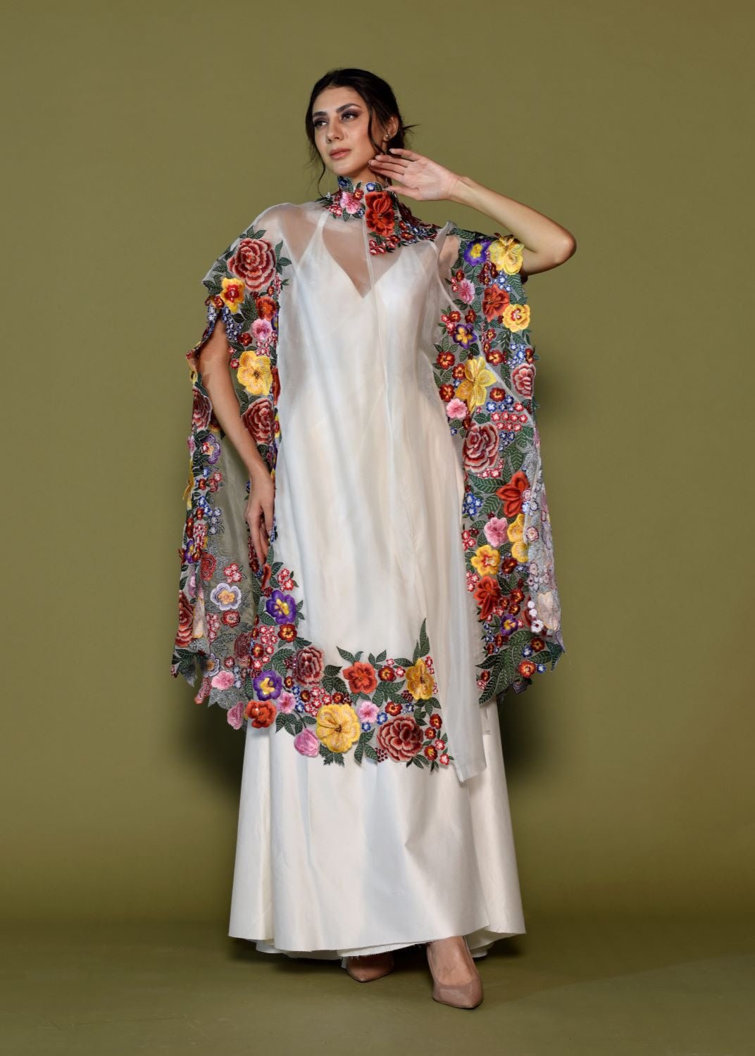 Ivory Silk Gown with Bold Floral Embroidered Cape.