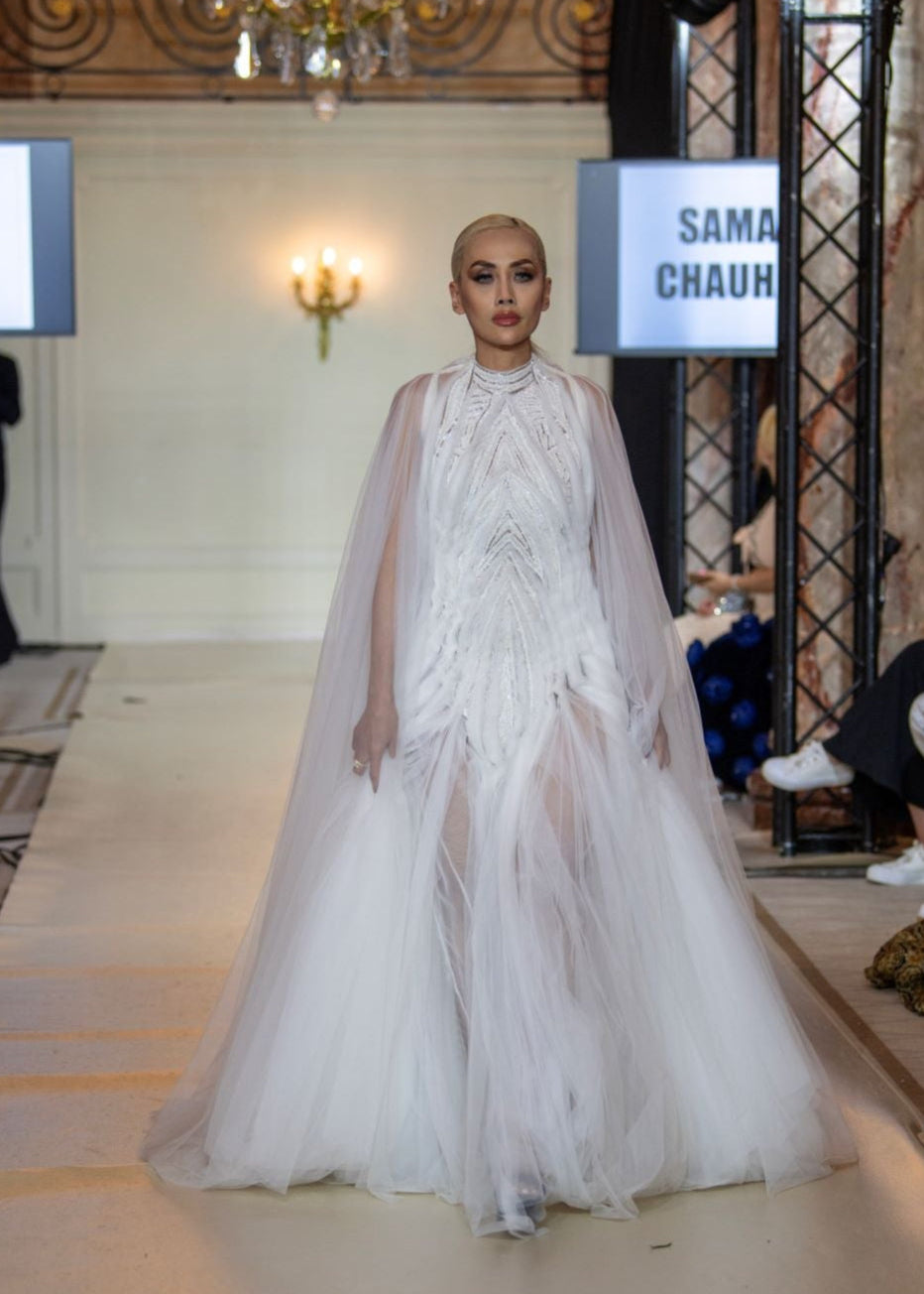 Radiate elegance in this ethereal white gown