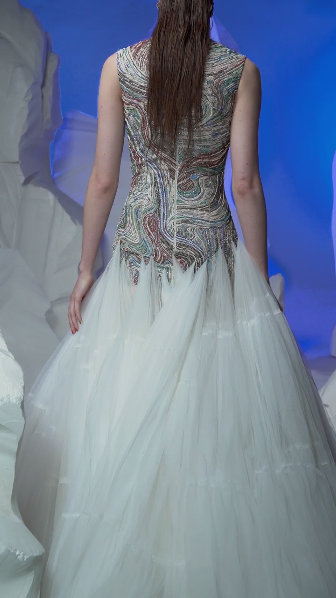 Floor-length gown featuring a high neckline