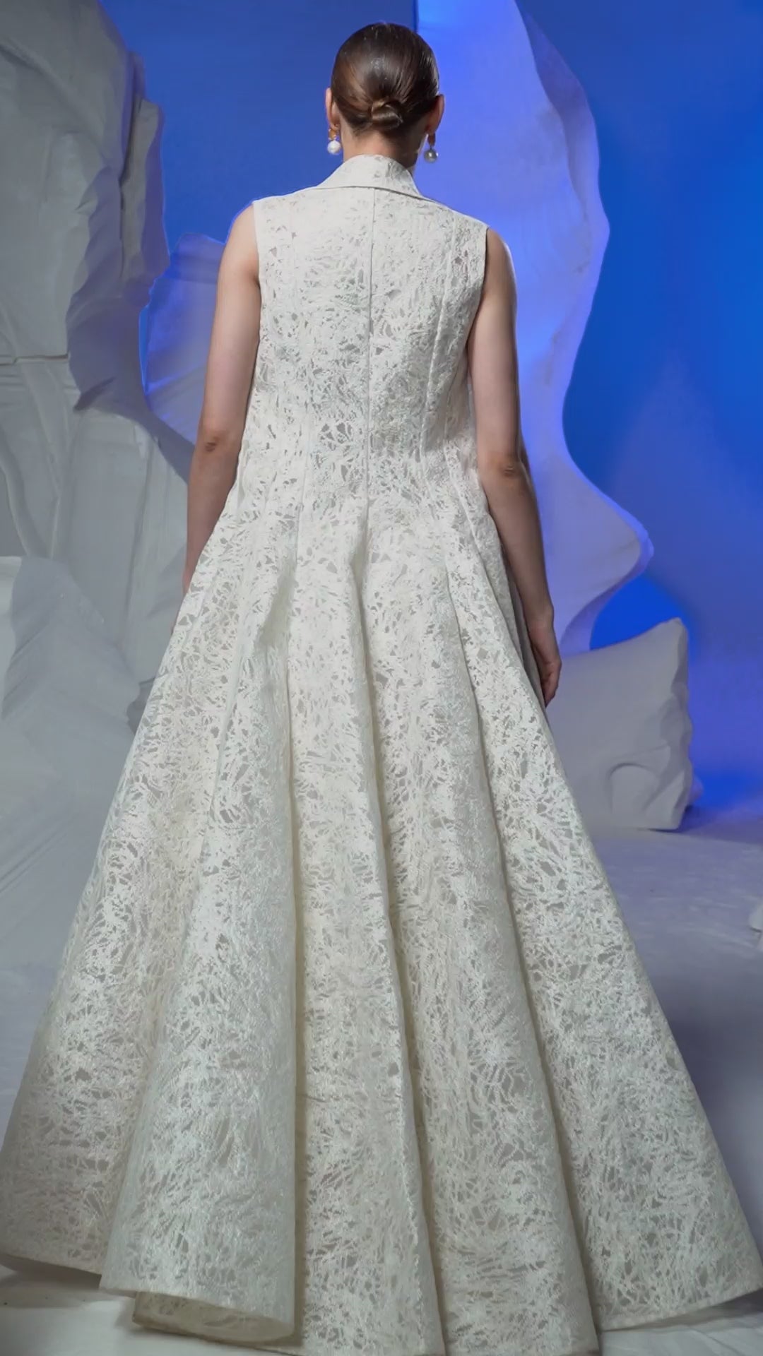 Ivory dress embellished with pearl embroidery