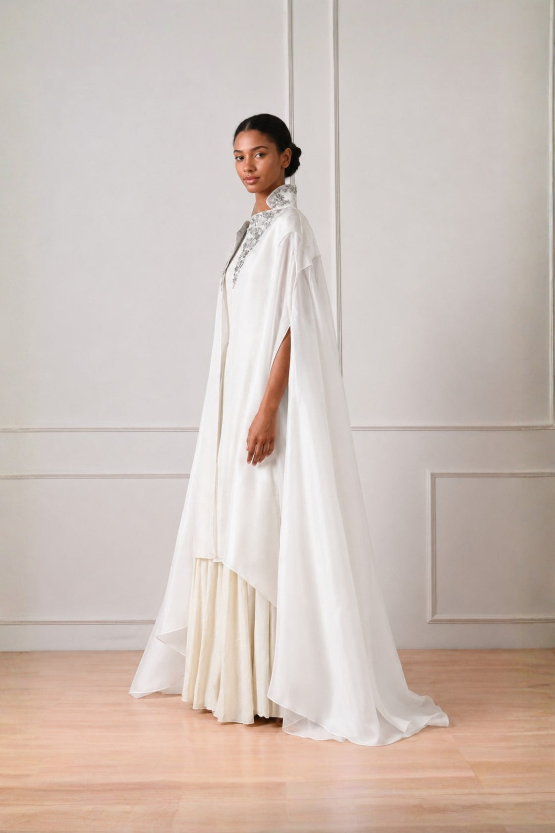 Ivory Front Open Cape With Embroidery Highlight On Neckline Paired With Dress