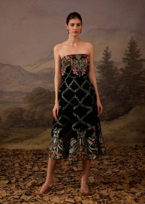 This strapless black midi dress features intricate floral embroidery.