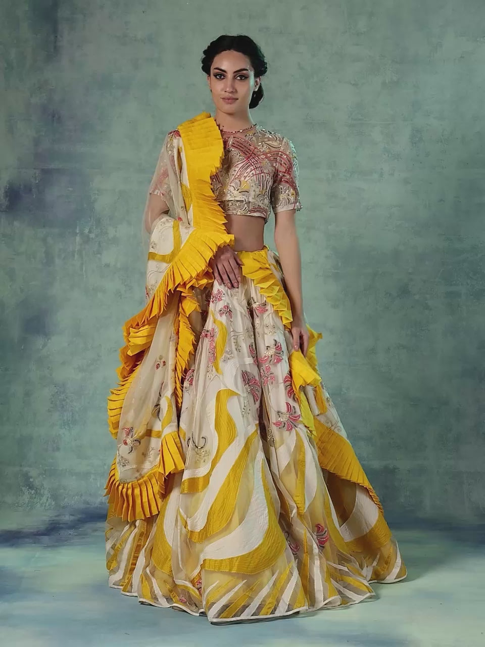 An Organza And Net Lehenga Set With Organza Dupatta