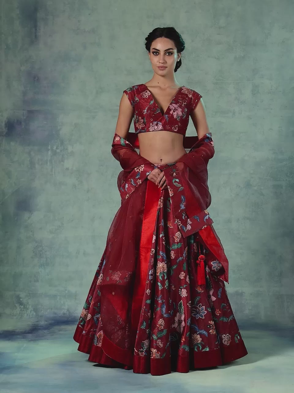 A printed cotton silk lehenga set with organza Dupatta.