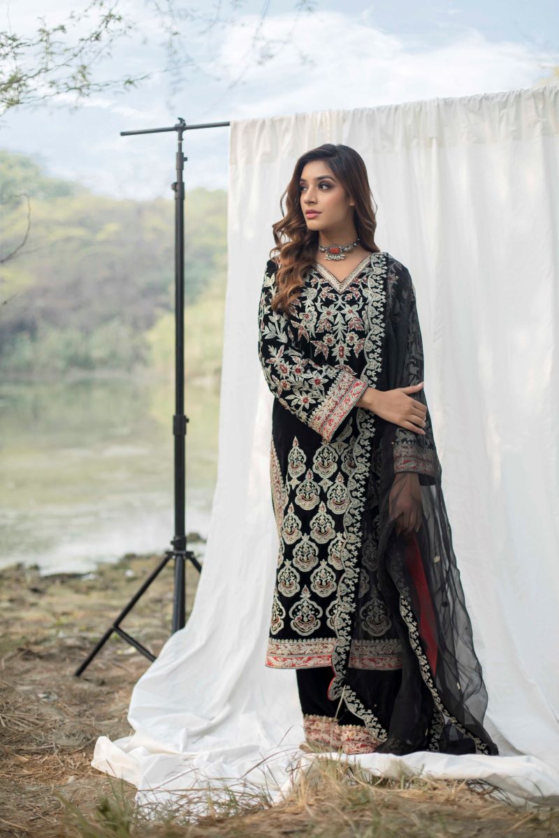 Velvet suit set adorned with zari and appliqué work and paired with organza Dupatta A