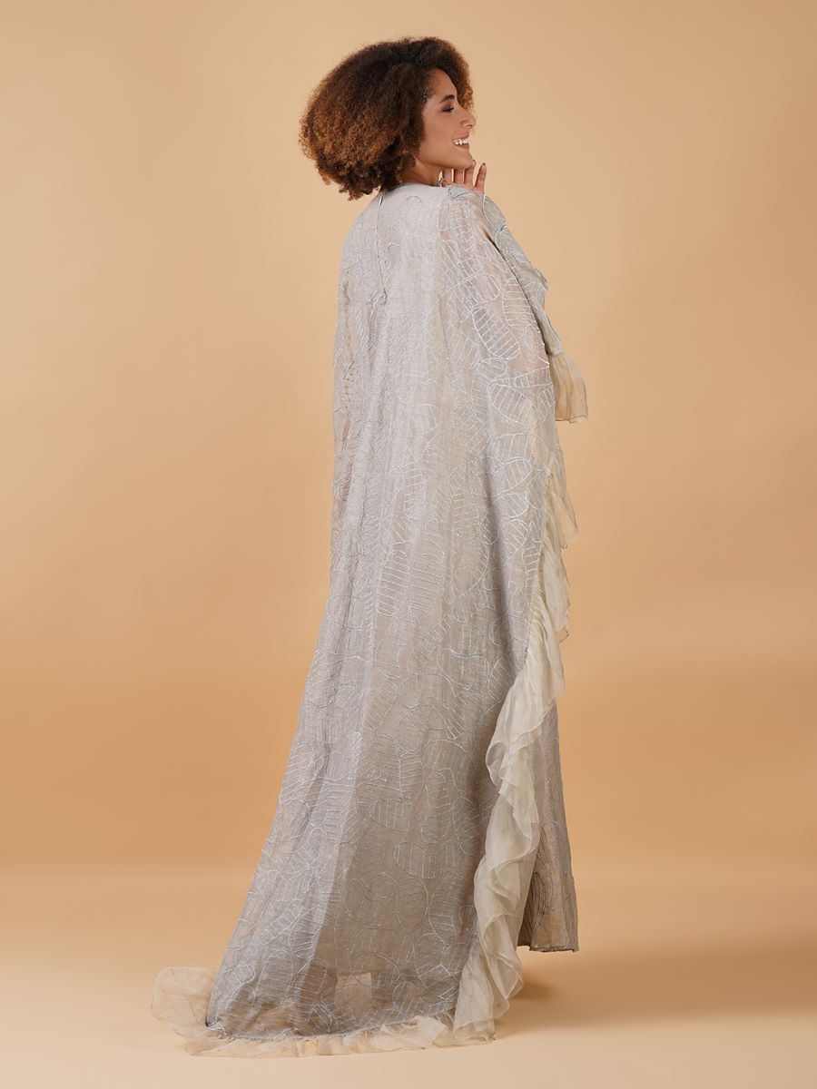 A long grey linen silk maxi dress with some fun 3D cut-outs on the neck