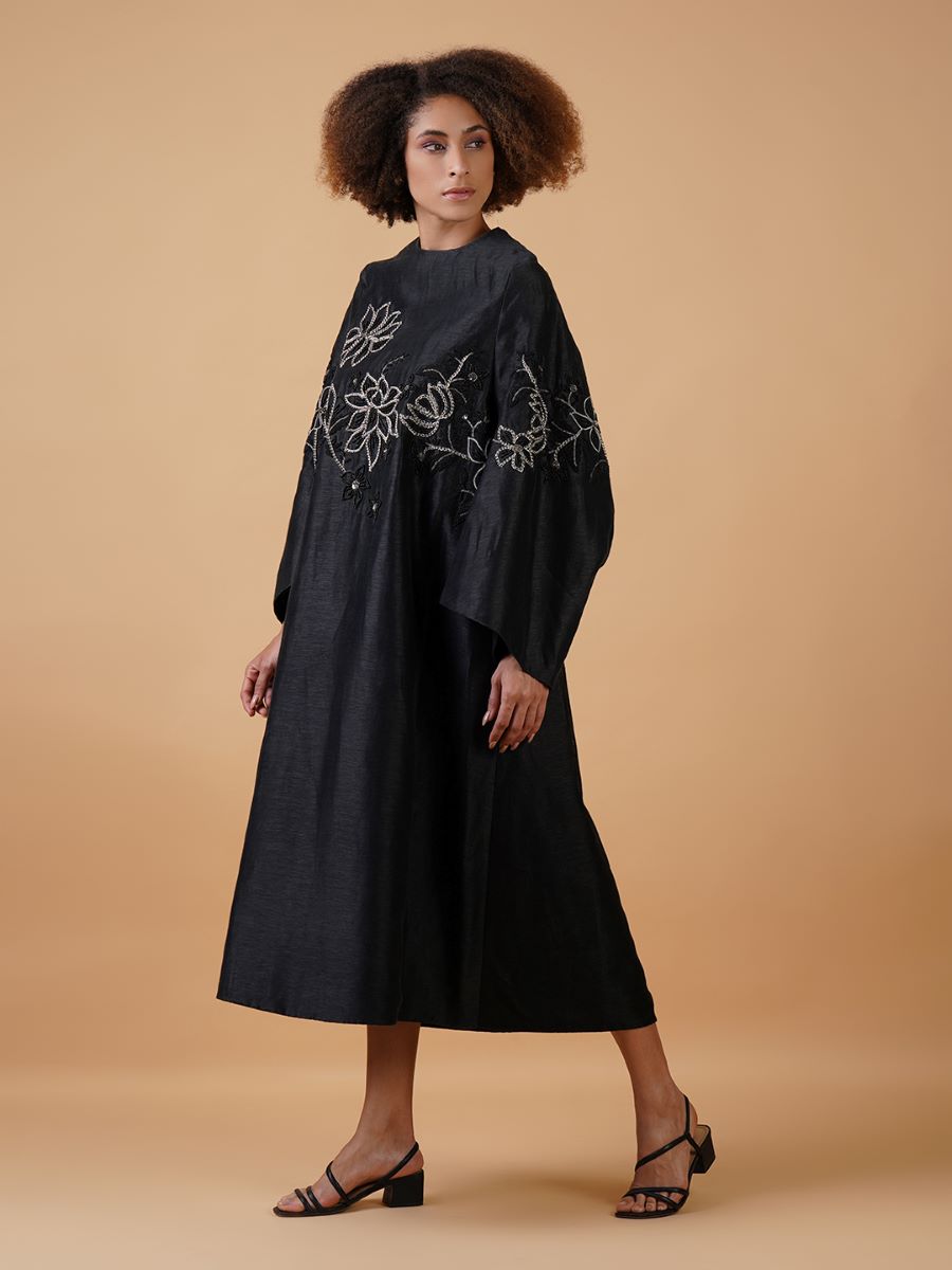 A lose-fit black cotton silk dress with silver embroidery flowers beautifully yoke