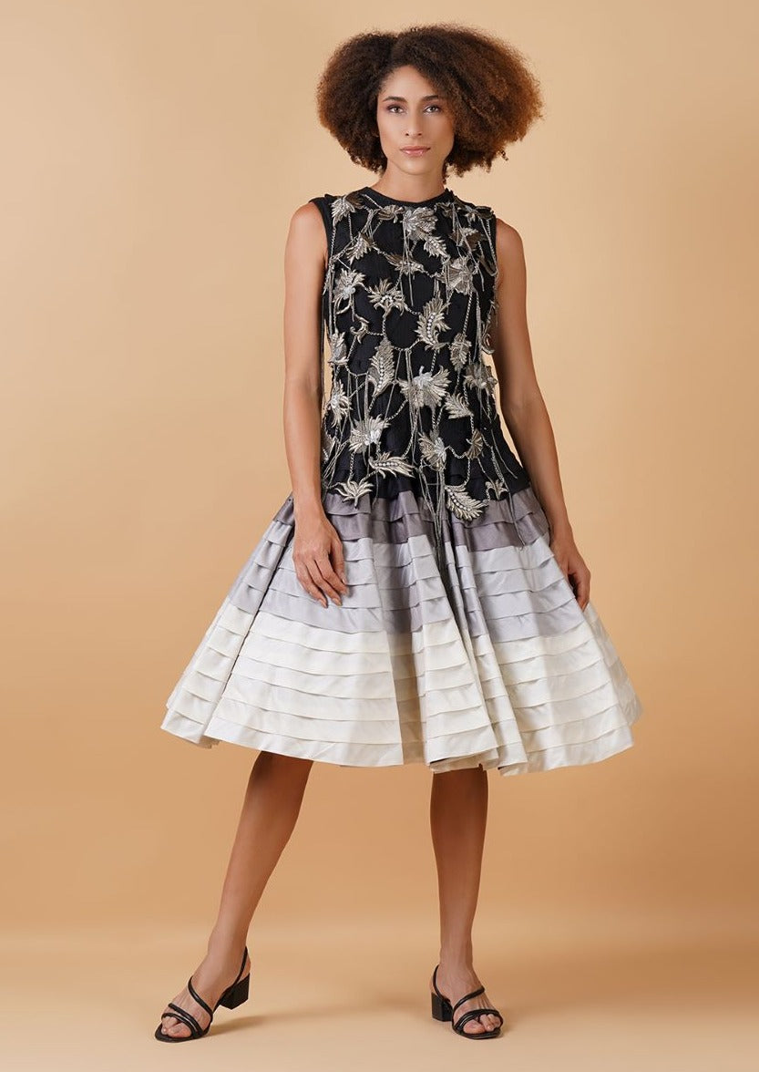 An A-line, knee-length dress made in cotton silk