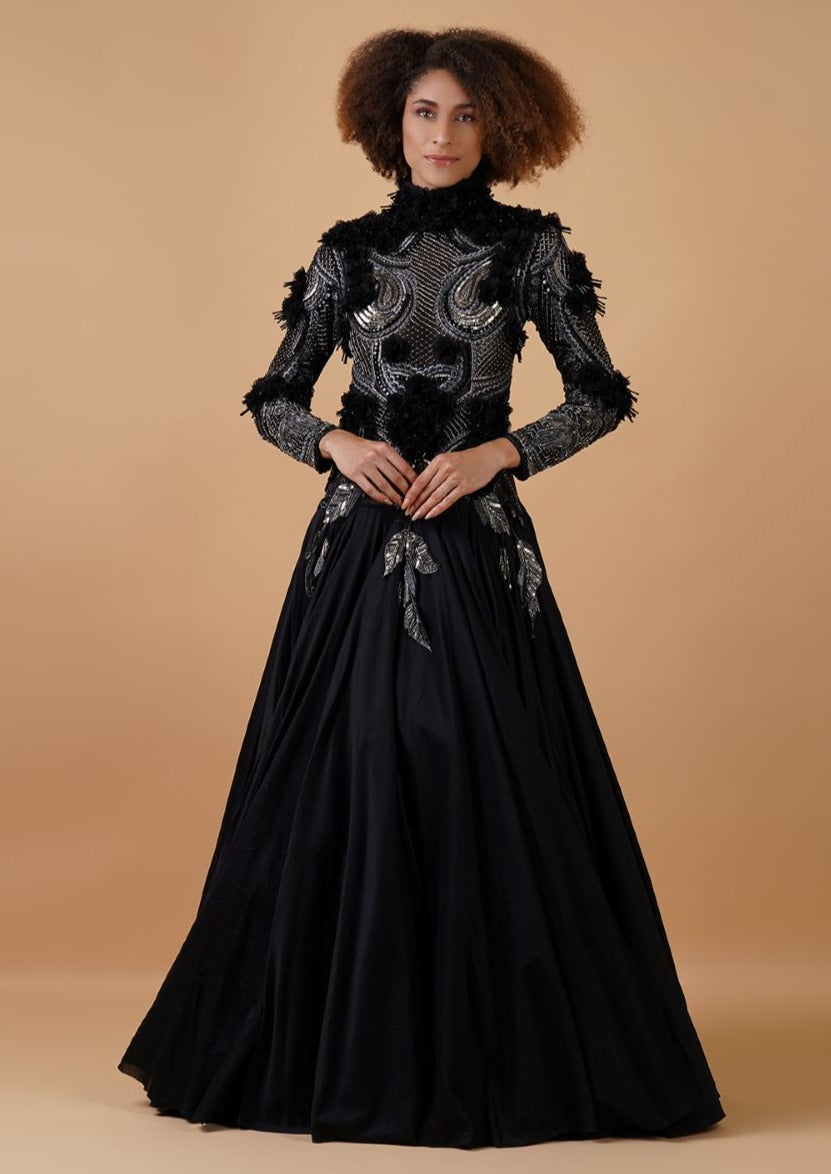A black cotton silk floor length gown with zero neck