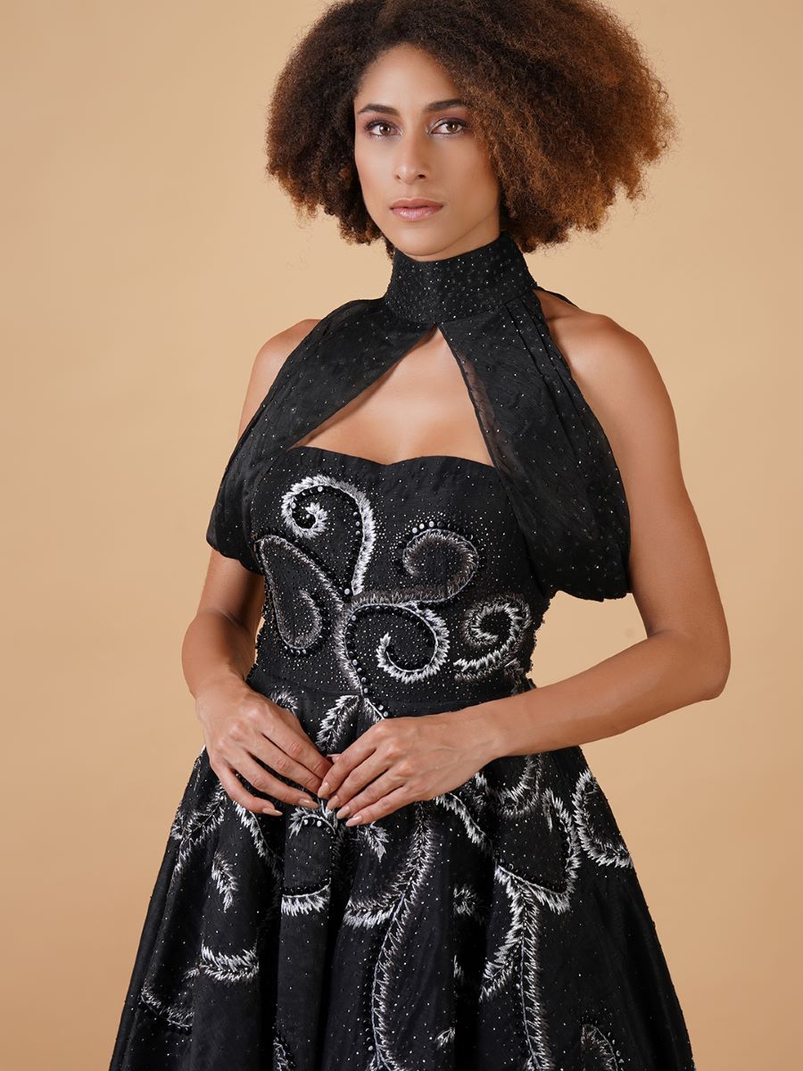 Featured here is a black chanderi A-line dress with a tube top