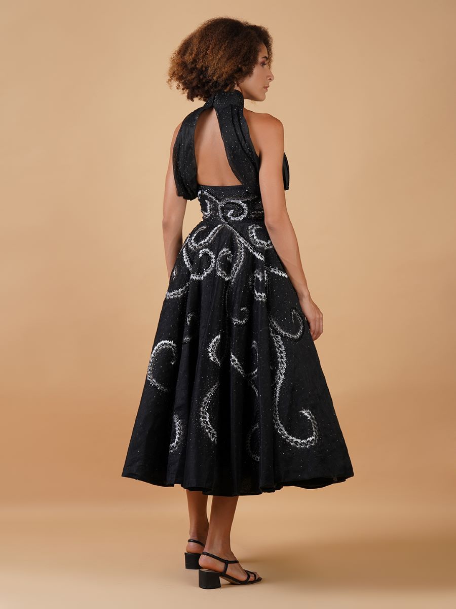 Featured here is a black chanderi A-line dress with a tube top